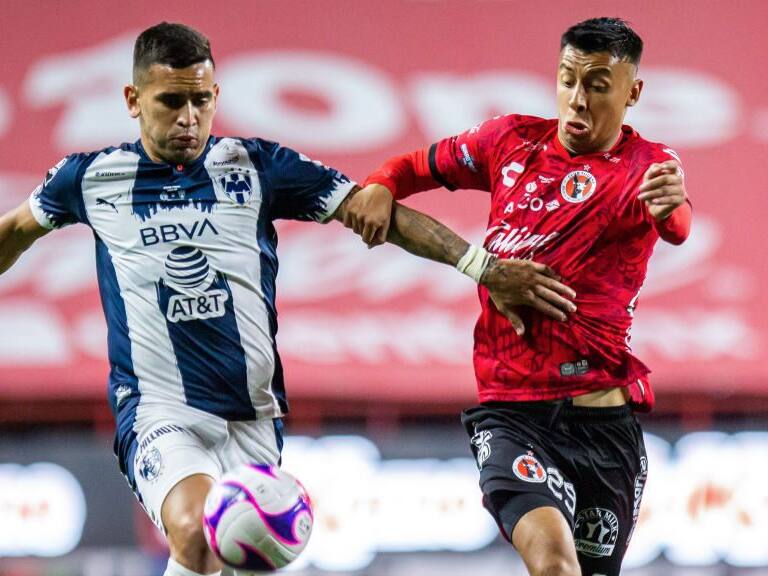 TIJUANA, MEXICO - OCTOBER 21: Sebastian Vegas of Monterrey fights for the ball with Edgar Lopez of Tijuana during the Final first leg match between Tijuana and Monterrey as part of the Copa MX 2020 at Caliente Stadium on October 21, 2020 in Tijuana, Mexico. (Photo by Carlos Heredia/Getty Images)