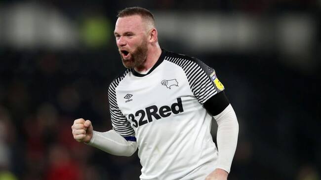 DERBY, ENGLAND - JANUARY 02: Wayne Rooney of Derby County celebrates his assist of the opening goal during the Sky Bet Championship match between Derby County and Barnsley at Pride Park Stadium on January 2, 2020 in Derby, England. (Photo by Marc Atkins/Offside/Offside via Getty Images)