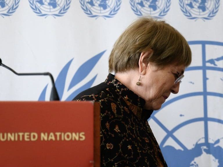 United Nations High Commissioner for Human Rights Michelle Bachelet leaves after she addressed the press on the opening day of the 50th session of the UN Human Rights Council, in Geneva on June 13, 2022. - UN rights chief Michelle Bachelet announced that she will not seek a second term, ending months of speculation about her intentions and amid growing criticism of her lax stance on rights abuses in China. (Photo by Fabrice COFFRINI / AFP) (Photo by FABRICE COFFRINI/AFP via Getty Images)