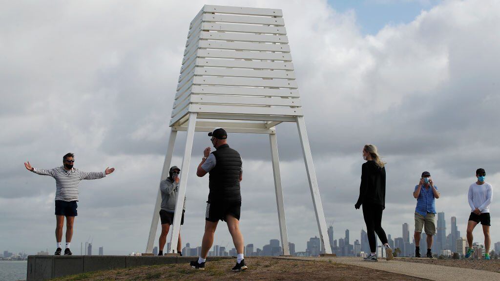 MELBOURNE, AUSTRALIA - SEPTEMBER 14: People are seen exercising at Point Ormond lookout in Elwood on September 14, 2020 in Melbourne, Australia. Metropolitan Melbourne's stage 4 lockdown restrictions have been eased slightly as of midnight 14 September, with the curfew eased to 9pm to 5am. Permitted exercise time has increased to two hours per day, public outdoor gatherings of two people or a household is now permitted for up to two hours while social "bubbles" will be allowed for people who live alone. Metropolitan Melbourne has been subject to Stage 4 restrictions since 2 August 2020 in response to the re-emergence of COVID-19 in the community.  (Photo by Daniel Pockett/Getty Images)