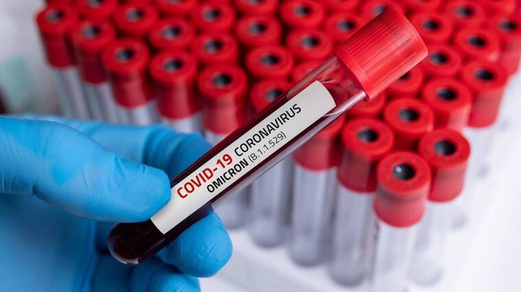 Doctor with blood sample of Covid-19 Omicron B.1.1.529 Variant and general data of covid-19 Coronavirus Mutations.