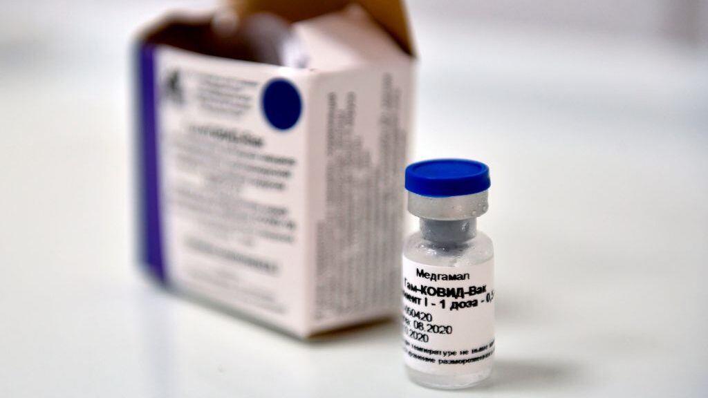 A vial with Russia's new coronavirus vaccine is seen prior to a vaccination of a volunteer in a post-registration trials, Moscow, September 10, 2020. - Russia announced last month that its vaccine, named "Sputnik V" after the Soviet-era satellite that was the first launched into space in 1957, had already received approval. The vaccine was developed by the Gamaleya research institute in Moscow in coordination with the Russian defence ministry. (Photo by Natalia KOLESNIKOVA / AFP) (Photo by NATALIA KOLESNIKOVA/AFP via Getty Images)
