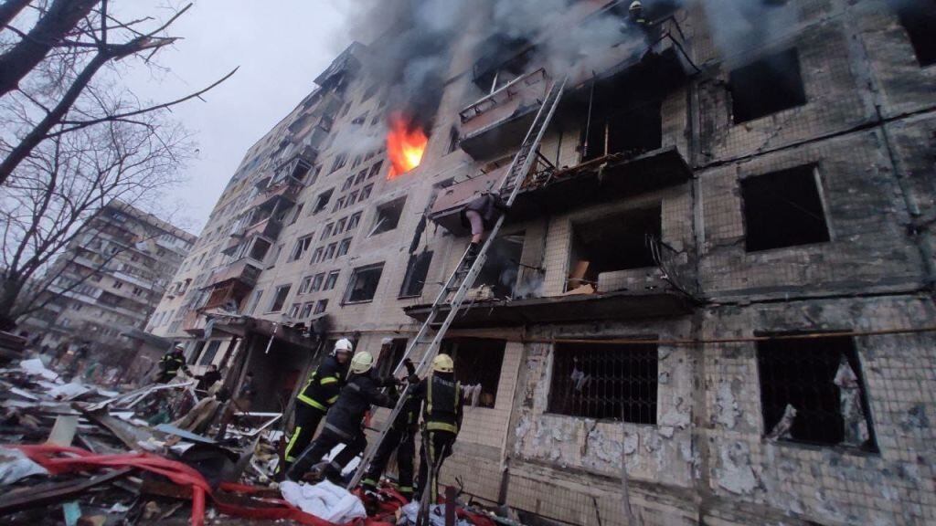 KYIV, UKRAINE - MARCH 14: (----EDITORIAL USE ONLY â MANDATORY CREDIT - "STATE EMERGENCY SERVICE OF UKRAINE / HANDOUT" - NO MARKETING NO ADVERTISING CAMPAIGNS - DISTRIBUTED AS A SERVICE TO CLIENTS----) Firefighters work by a damaged apartment building which was hit by Russian attack in Kyiv, Ukraine on March 14, 2022. At least two people were killed and dozens of others were wounded by Russian airstrikes that hit a high-rise building in Ukrainian capital Kyiv. (Photo by State&nbsp;Emergency&nbsp;Service of Ukraine/Handout/Anadolu Agency via Getty Images)