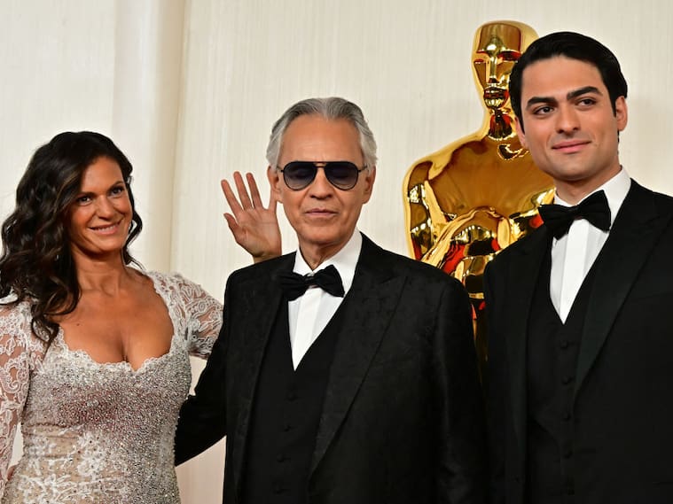 Italian tenor Andrea Bocelli, his wife Veronica Berti and his son Matteo Bocelli attend the 96th Annual Academy Awards at the Dolby Theatre in Hollywood, California on March 10, 2024. (Photo by Frederic J. Brown / AFP) (Photo by FREDERIC J. BROWN/AFP via Getty Images)