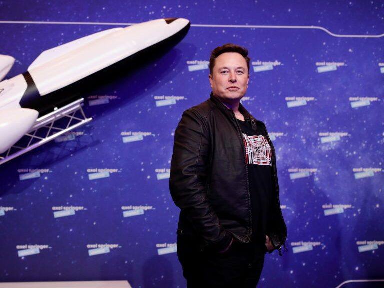 BERLIN, GERMANY DECEMBER 01: SpaceX owner and Tesla CEO Elon Musk arrives on the red carpet for the Axel Springer Award 2020 on December 01, 2020 in Berlin, Germany. (Photo by Hannibal Hanschke-Pool/Getty Images)