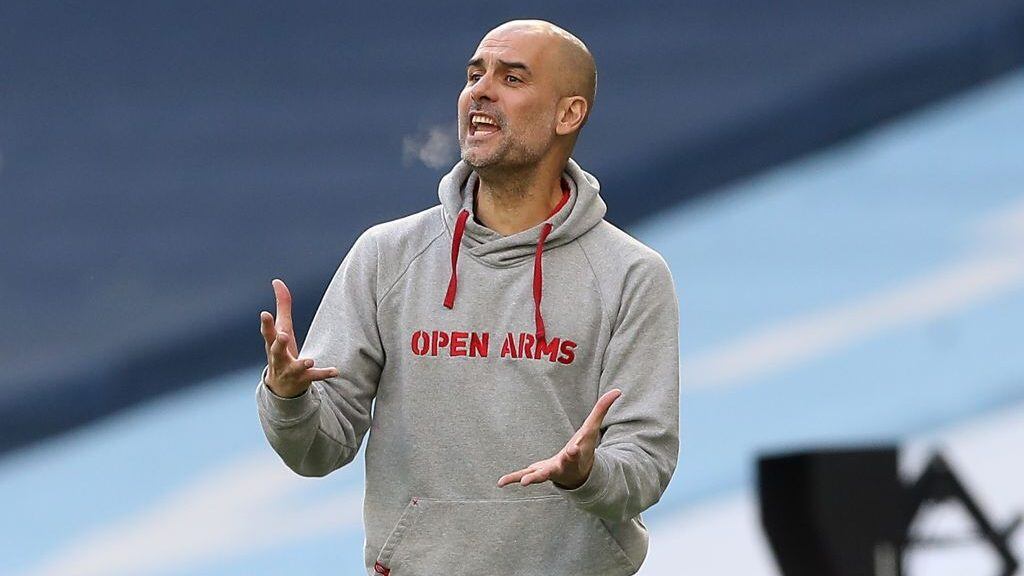 Manchester City's Spanish manager Pep Guardiola shouts instructions to his players from the touchline during the English Premier League football match between Manchester City and West Ham United at the Etihad Stadium in Manchester, north west England, on February 27, 2021. (Photo by Martin Rickett / POOL / AFP) / RESTRICTED TO EDITORIAL USE. No use with unauthorized audio, video, data, fixture lists, club/league logos or 'live' services. Online in-match use limited to 120 images. An additional 40 images may be used in extra time. No video emulation. Social media in-match use limited to 120 images. An additional 40 images may be used in extra time. No use in betting publications, games or single club/league/player publications. /  (Photo by MARTIN RICKETT/POOL/AFP via Getty Images)
