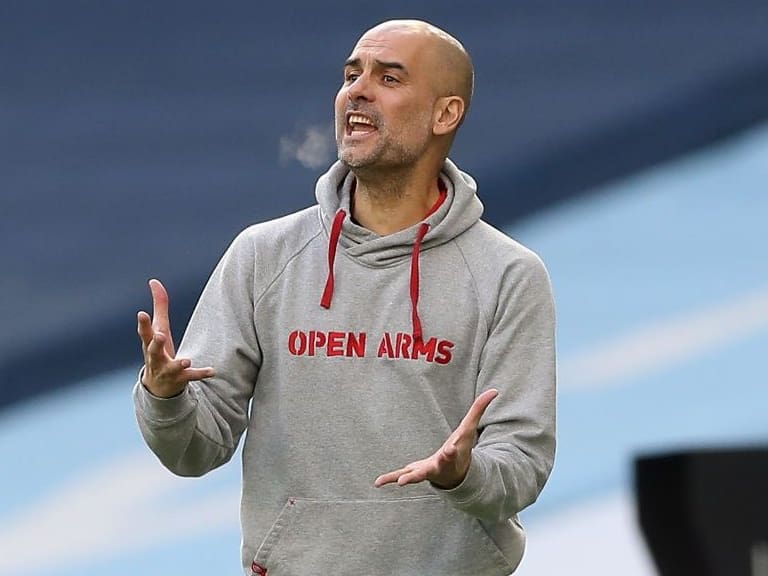 Manchester City&#039;s Spanish manager Pep Guardiola shouts instructions to his players from the touchline during the English Premier League football match between Manchester City and West Ham United at the Etihad Stadium in Manchester, north west England, on February 27, 2021. (Photo by Martin Rickett / POOL / AFP) / RESTRICTED TO EDITORIAL USE. No use with unauthorized audio, video, data, fixture lists, club/league logos or &#039;live&#039; services. Online in-match use limited to 120 images. An additional 40 images may be used in extra time. No video emulation. Social media in-match use limited to 120 images. An additional 40 images may be used in extra time. No use in betting publications, games or single club/league/player publications. /  (Photo by MARTIN RICKETT/POOL/AFP via Getty Images)