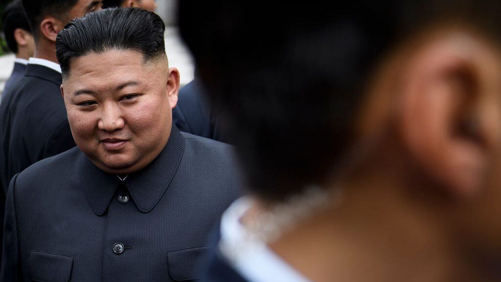 North Korea's leader Kim Jong-un walks to a meeting with US President Donald Trump in the Demilitarized Zone (DMZ) on June 30, 2019, in Panmunjom, Korea. (Photo by Brendan Smialowski / AFP)        (Photo credit should read BRENDAN SMIALOWSKI/AFP via Getty Images)