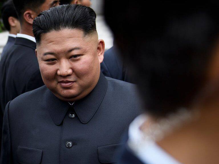 North Korea's leader Kim Jong-un walks to a meeting with US President Donald Trump in the Demilitarized Zone (DMZ) on June 30, 2019, in Panmunjom, Korea. (Photo by Brendan Smialowski / AFP) (Photo credit should read BRENDAN SMIALOWSKI/AFP via Getty Images)