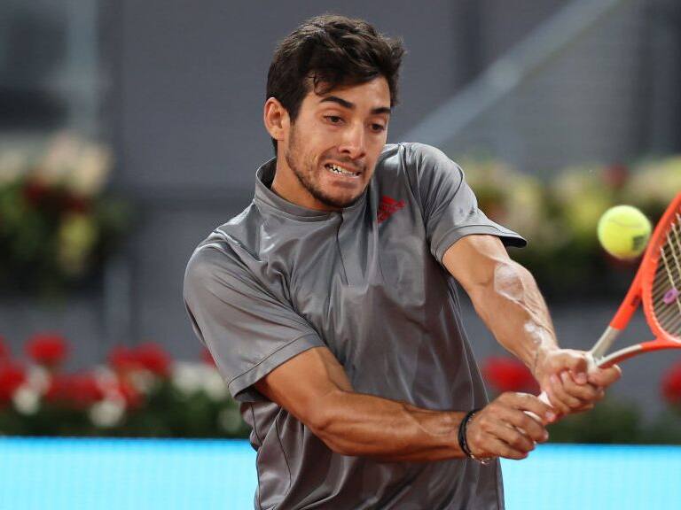 MADRID, SPAIN - MAY 07: Cristian Garín of Chile plays a backhand shot during their Quarter Final match against Matteo Berrettini of Italy during Day Nine of the Mutua Madrid Open at La Caja Magica on May 07, 2021 in Madrid, Spain. (Photo by Clive Brunskill/Getty Images)