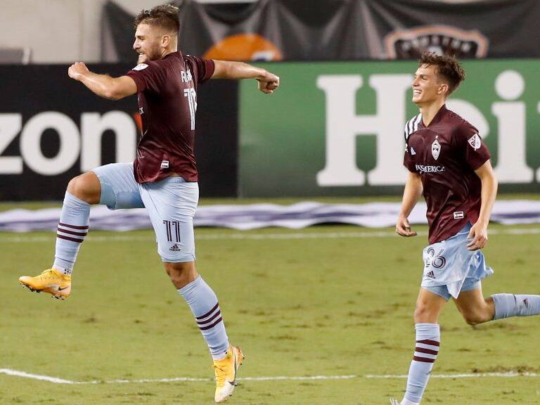 HOUSTON, TEXAS - NOVEMBER 08: Diego Rubio #11 of Colorado Rapids celebrates after scoring a goal in stoppage time against the Houston Dynamo at BBVA Compass Stadium on November 08, 2020 in Houston, Texas. (Photo by Tim Warner/Getty Images)