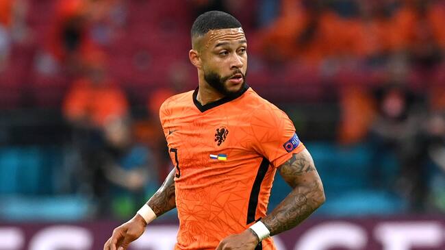 AMSTERDAM, NETHERLANDS - JUNE 13: Memphis Depay of Netherlands runs with the ball during the UEFA Euro 2020 Championship Group C match between Netherlands and Ukraine at the Johan Cruijff ArenA on June 13, 2021 in Amsterdam, Netherlands. (Photo by John Thys - Pool/Getty Images)