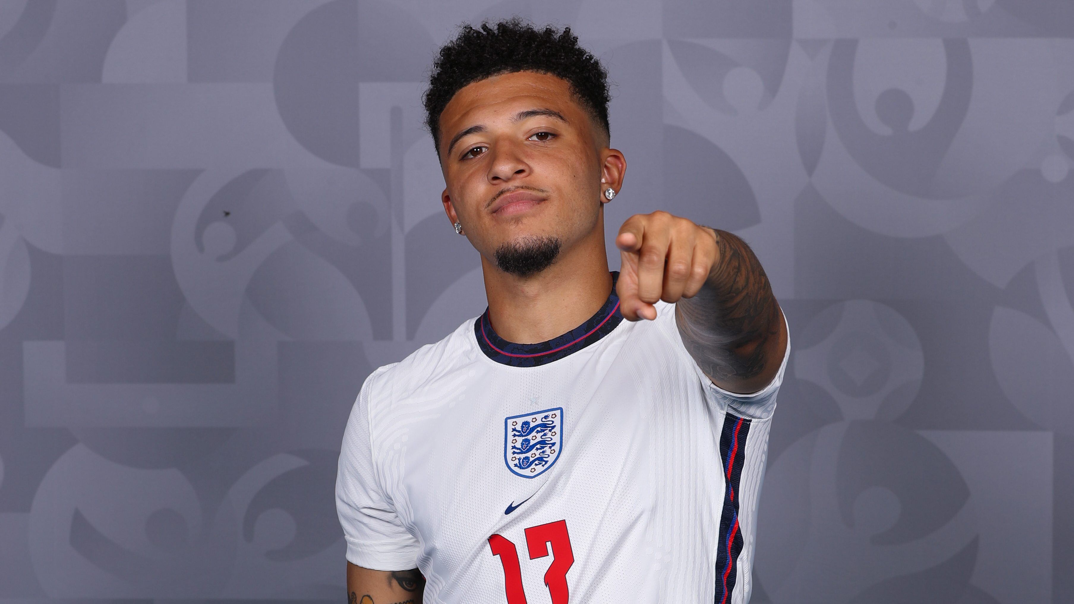 BURTON UPON TRENT, ENGLAND - JUNE 08: Jadon Sancho of England poses during the official UEFA Euro 2020 media access day at St George's Park Futsal Arena on June 08, 2021 in Burton upon Trent, England. (Photo by Patrick Elmont - UEFA/UEFA via Getty Images)