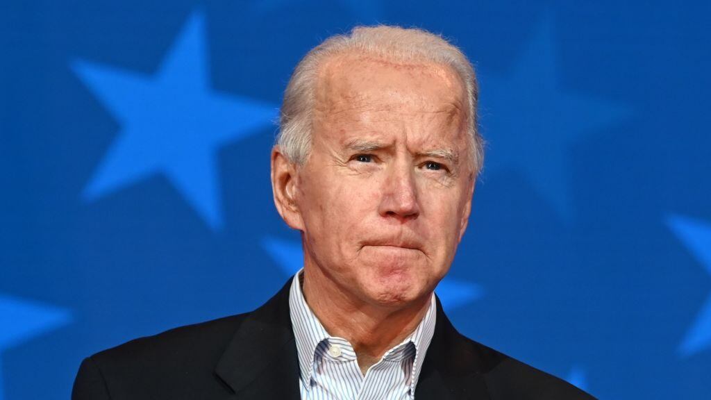 Democratic Presidential candidate Joe Biden looks on while speaking at the Queen venue in Wilmington, Delaware, on November 5, 2020. - The nail-biting US election was on the cusp of finally producing a winner Thursday, with Democrat Joe Biden solidifying his lead over President Donald Trump and the decisive state of Pennsylvania set to release results. (Photo by JIM WATSON / AFP) (Photo by JIM WATSON/AFP via Getty Images)
