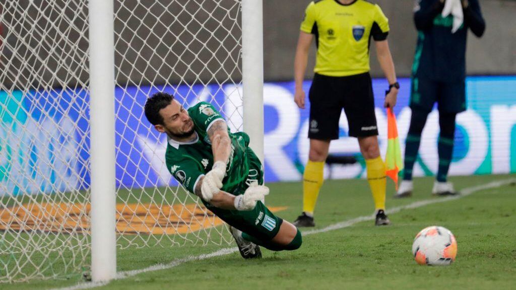 Argentina's Racing Club Chilean goalkeeper Gabriel Arias stops a shot by Brazil's Flamengo Willian Arao (out of frame) during the penalty shootout in their closed-door Copa Libertadores round before the quarterfinals football match at Maracana Stadium in Rio de Janeiro, Brazil, on December 1, 2020. (Photo by Antonio LACERDA / POOL / AFP) (Photo by ANTONIO LACERDA/POOL/AFP via Getty Images)