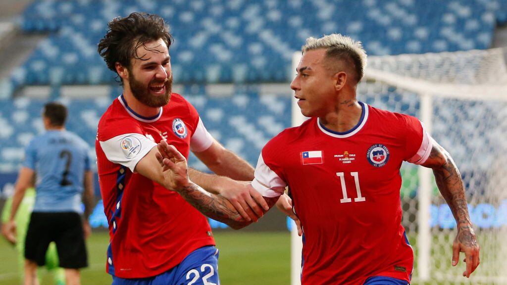 CUIABA, BRAZIL - JUNE 21: Eduardo Vargas (R) of Chile celebrates with teammate Ben Brereton after scoring the first goal of his team during a group A match between Uruguay and Chile as part of Conmebol Copa America Brazil 2021 at Arena Pantanal on June 21, 2021 in Cuiaba, Brazil. (Photo by Miguel Schincariol/Getty Images)