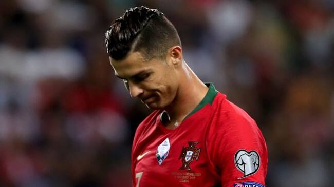Portuguese soccer star Cristiano Ronaldo has tested positive for COVID-19, Portugals Football Federation said in a statement in Lisbon, Portugal, on October 13, 2020. The 35-year-old Juventus striker will miss Wednesdays UEFA Nations League game against Sweden but is well, has no symptoms and is in isolation, the federation said. (FILE PHOTO) (Photo by Pedro Fiúza/NurPhoto via Getty Images)