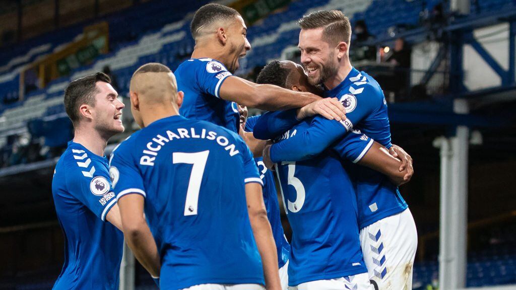 LIVERPOOL, ENGLAND - DECEMBER 19: Yerry Mina of Everton celebrates scoring his teams second goal with team mates during the Premier League match between Everton and Arsenal at Goodison Park on December 19, 2020 in Liverpool, England. A limited number of fans (2000) are welcomed back to stadiums to watch elite football across England. This was following easing of restrictions on spectators in tiers one and two areas only. (Photo by Emma Simpson - Everton FC/Everton FC via Getty Images)