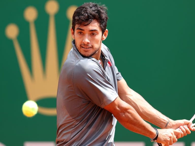 MONTE-CARLO, MONACO - APRIL 13: Cristian Garin of Chile plays a back hand in his mens singles match against Felix Auger-Aliassime of Canada during the first round on day three of the Rolex Monte-Carlo Masters at Monte-Carlo Country Club on April 13, 2021 in Monte-Carlo, Monaco. (Photo by Alexander Hassenstein/Getty Images)