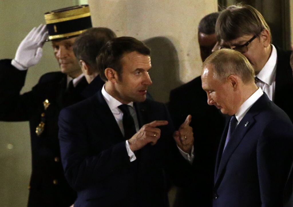 Los mandatarios Emmanuel Macron y Vladimir Putin en una reunión en 2019