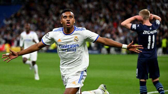 Real Madrid's Brazilian forward Rodrygo celebrates his goal during the UEFA Champions League semi-final second leg football match between Real Madrid CF and Manchester City at the Santiago Bernabeu stadium in Madrid on May 4, 2022. (Photo by GABRIEL BOUYS / AFP) (Photo by GABRIEL BOUYS/AFP via Getty Images)