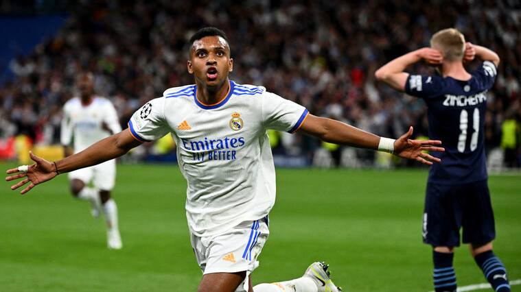 Real Madrid's Brazilian forward Rodrygo celebrates his goal during the UEFA Champions League semi-final second leg football match between Real Madrid CF and Manchester City at the Santiago Bernabeu stadium in Madrid on May 4, 2022. (Photo by GABRIEL BOUYS / AFP) (Photo by GABRIEL BOUYS/AFP via Getty Images)