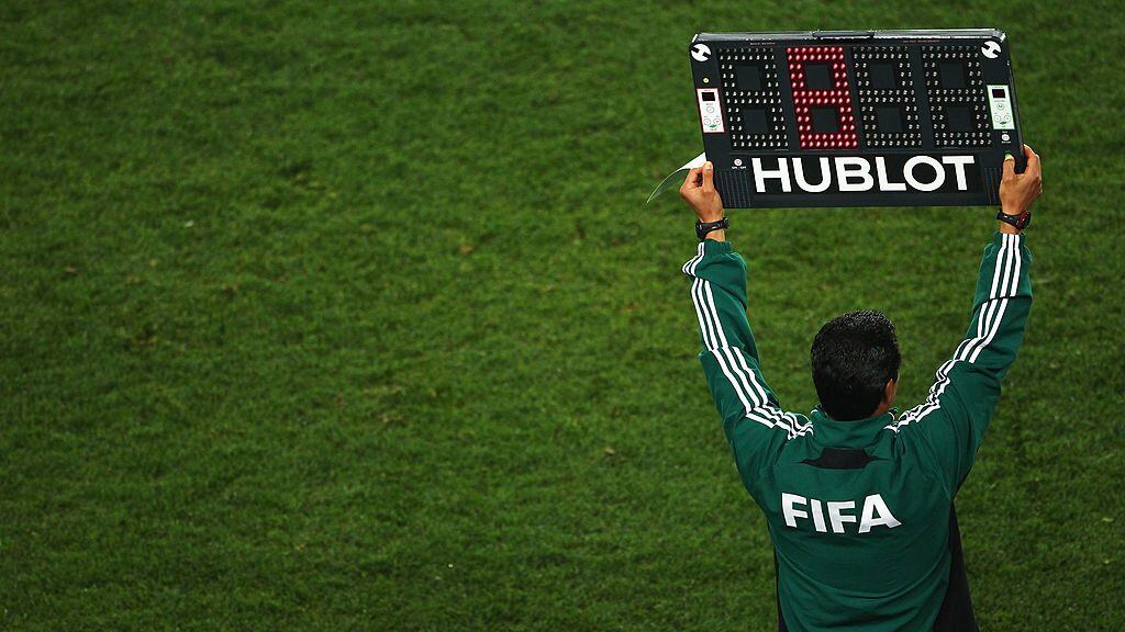 JOHANNESBURG, SOUTH AFRICA - JULY 03: A FIFA match official holds up an electronic board to signal a substitution during the 2010 FIFA World Cup South Africa Quarter Final match between Paraguay and Spain at Ellis Park Stadium on July 3, 2010 in Johannesburg, South Africa. (Photo by Lars Baron/Getty Images)