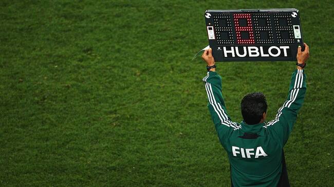 JOHANNESBURG, SOUTH AFRICA - JULY 03: A FIFA match official holds up an electronic board to signal a substitution during the 2010 FIFA World Cup South Africa Quarter Final match between Paraguay and Spain at Ellis Park Stadium on July 3, 2010 in Johannesburg, South Africa. (Photo by Lars Baron/Getty Images)