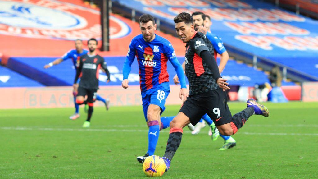 LONDON, ENGLAND - DECEMBER 19: Roberto Firminho of Liverpool scores their sides fifth goal during the Premier League match between Crystal Palace and Liverpool at Selhurst Park on December 19, 2020 in London, England. The match will be played without fans, behind closed doors as a Covid-19 precaution. (Photo by Adam Davy - Pool/Getty Images)