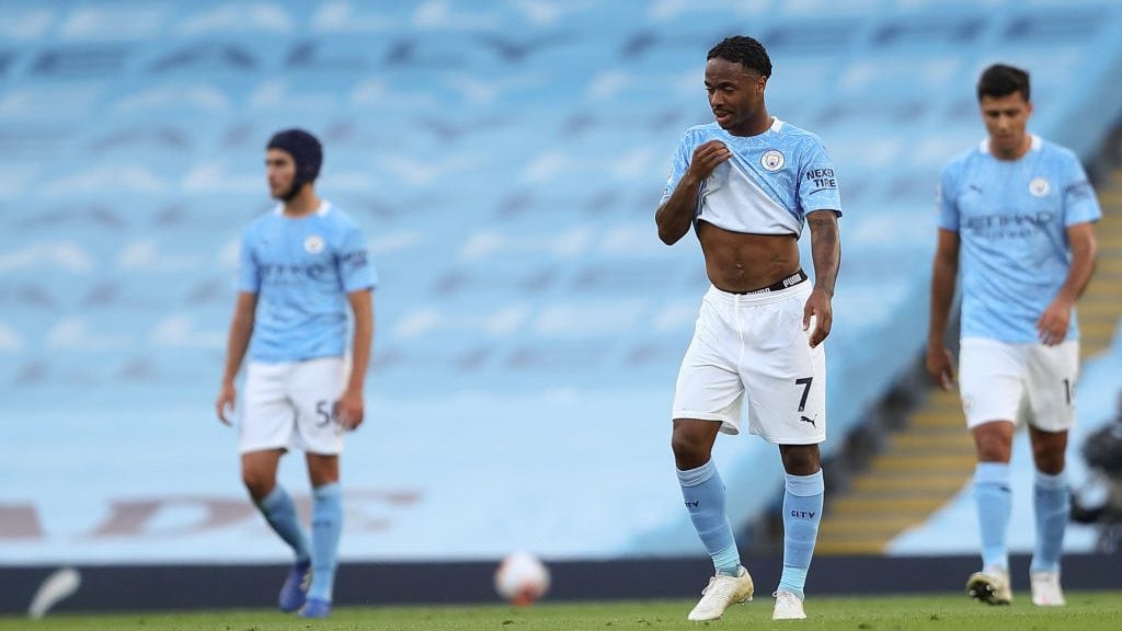 MANCHESTER, ENGLAND - SEPTEMBER 27: A dejected Raheem Sterling of Manchester City after Jamie Vardy of Leicester City scored a goal from the penalty spot to make it 1-1 during the Premier League match between Manchester City and Leicester City at Etihad Stadium on September 27, 2020 in Manchester, United Kingdom. Sporting stadiums around the UK remain under strict restrictions due to the Coronavirus Pandemic as Government social distancing laws prohibit fans inside venues resulting in games being played behind closed doors. (Photo by James Williamson - AMA/Getty Images)