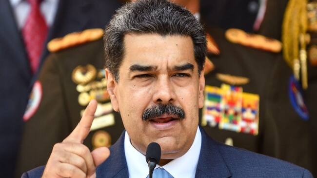 CARACAS, VENEZUELA - MARCH 12: President of Venezuela Nicolas Maduro speaks during a press conference at Miraflores Government Palace on March 12, 2020 in Caracas, Venezuela. Maduro announced a travel ban for travelers flying in from Europe and Colombia and restricted gatherings and massive events in an attempt to stem the proliferation of the COVID-19 pandemic. Maduro also confirmed there are no cases in Venezuela. (Photo by Carolina Cabral/Getty Images)