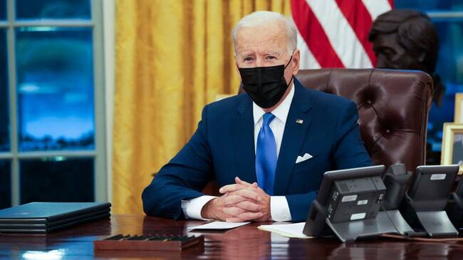 WASHINGTON, DC - FEBRUARY 02: U.S. President Joe Biden makes brief remarks before signing several executive orders directing immigration actions for his administration in the Oval Office at the White House on February 02, 2021 in Washington, DC. The orders will aim to reunite migrant families that were separated at the U.S.-Mexico border and authorize a wholesale review of former President Donald Trump's immigration policies. (Photo by Doug Mills-Pool/Getty Images)