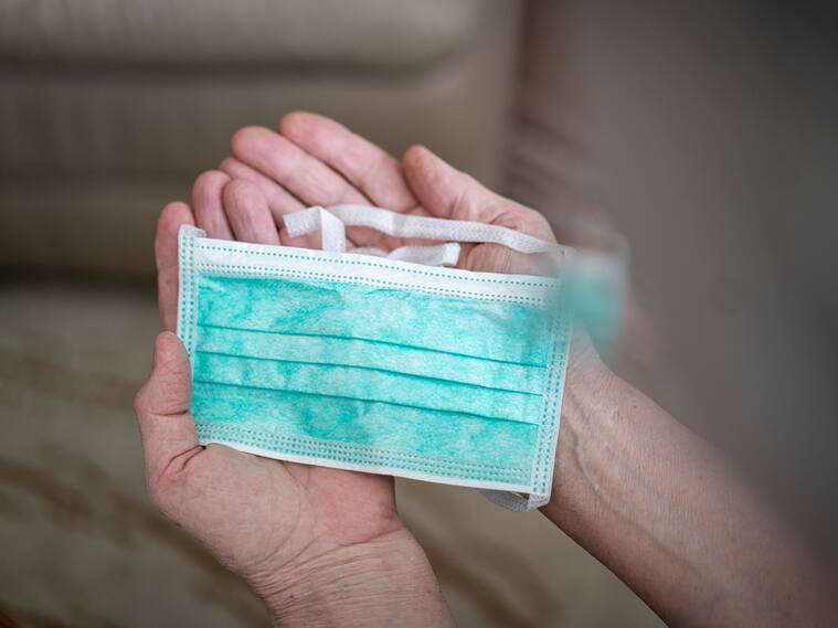 Coronavirus mask in hands
