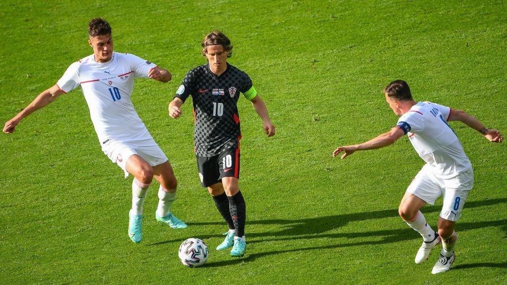 Czech Republic's forward Patrik Schick (L) vies with Croatia's midfielder Luka Modric during the UEFA EURO 2020 Group D football match between Croatia and Czech Republic at Hampden Park in Glasgow on June 18, 2021. (Photo by ANDY BUCHANAN / POOL / AFP) (Photo by ANDY BUCHANAN/POOL/AFP via Getty Images)