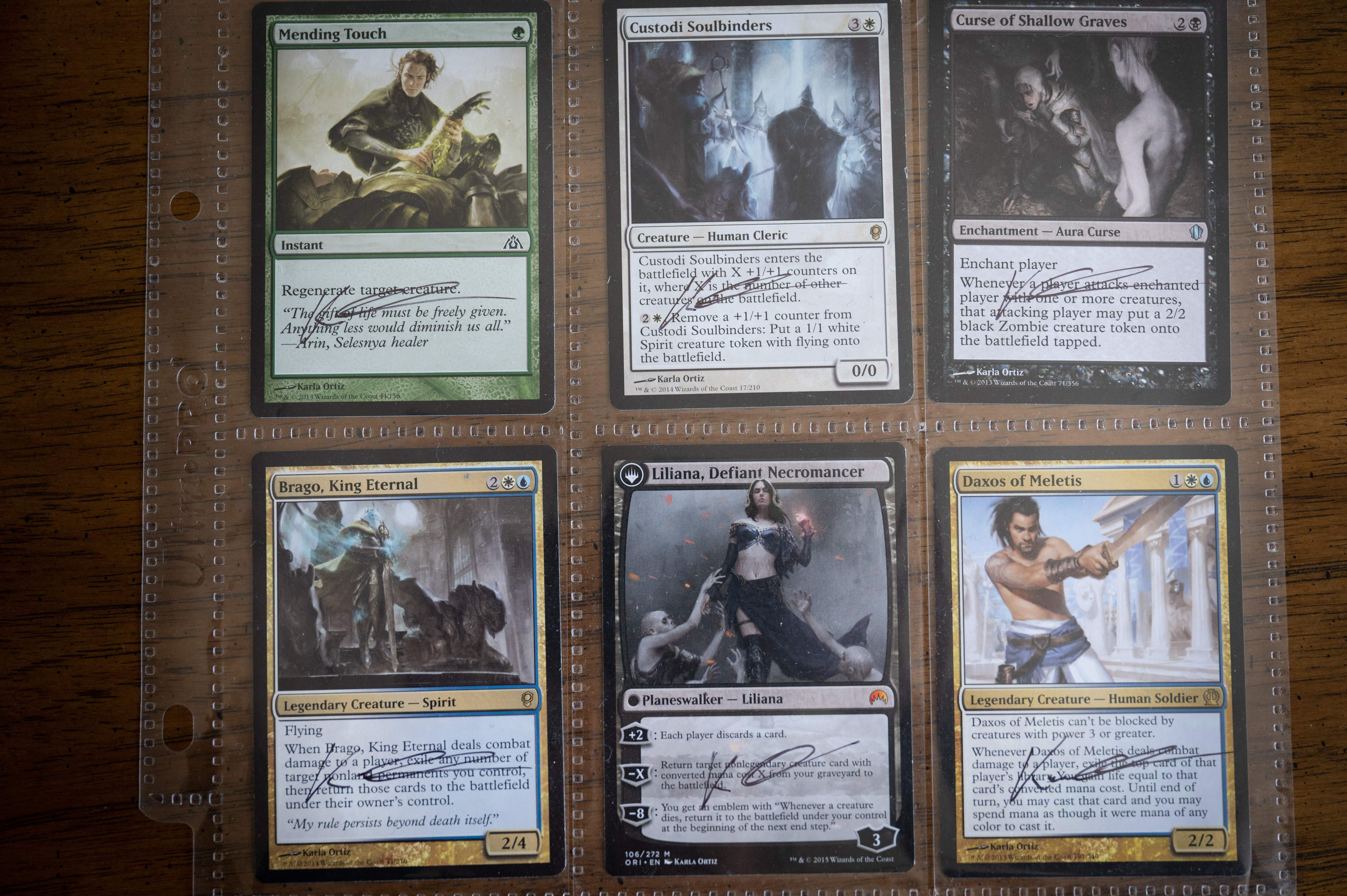 Illustrations done by artist Karla Ortiz for Magic: The Gathering playing cards are displayed in her studio in San Francisco, California, on March 8, 2023. - Ortiz and two other artists have filed a class-action lawsuit against companies with art-generating services. (Photo by Amy Osborne / AFP) / RESTRICTED TO EDITORIAL USE - MANDATORY MENTION OF THE ARTIST UPON PUBLICATION - TO ILLUSTRATE THE EVENT AS SPECIFIED IN THE CAPTION (Photo by AMY OSBORNE/AFP via Getty Images)