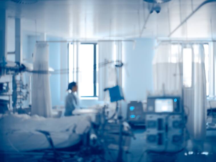Equipped intensive care unit of modern hospital, unfocused background.