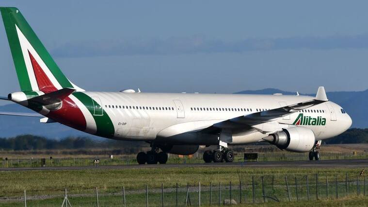 An Airbus A320 bearing the livery of Alitalia airline taxies on the tarmac prior taking off from Rome's Fiumicino airport on May 31, 2019. (Photo by Alberto PIZZOLI / AFP) (Photo credit should read ALBERTO PIZZOLI/AFP via Getty Images)