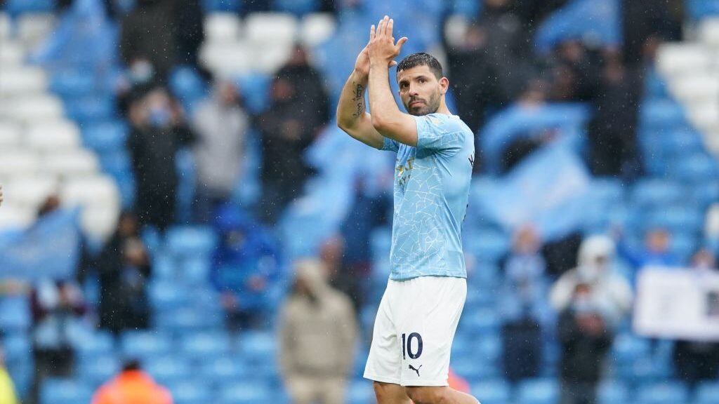 Manchester City's Argentinian striker Sergio Aguero applauds at the end of the English Premier League football match between Manchester City and Everton at the Etihad Stadium in Manchester, north west England, on May 23, 2021. - RESTRICTED TO EDITORIAL USE. No use with unauthorized audio, video, data, fixture lists, club/league logos or 'live' services. Online in-match use limited to 120 images. An additional 40 images may be used in extra time. No video emulation. Social media in-match use limited to 120 images. An additional 40 images may be used in extra time. No use in betting publications, games or single club/league/player publications. (Photo by Dave Thompson / POOL / AFP) / RESTRICTED TO EDITORIAL USE. No use with unauthorized audio, video, data, fixture lists, club/league logos or 'live' services. Online in-match use limited to 120 images. An additional 40 images may be used in extra time. No video emulation. Social media in-match use limited to 120 images. An additional 40 images may be used in extra time. No use in betting publications, games or single club/league/player publications. / RESTRICTED TO EDITORIAL USE. No use with unauthorized audio, video, data, fixture lists, club/league logos or 'live' services. Online in-match use limited to 120 images. An additional 40 images may be used in extra time. No video emulation. Social media in-match use limited to 120 images. An additional 40 images may be used in extra time. No use in betting publications, games or single club/league/player publications. (Photo by DAVE THOMPSON/POOL/AFP via Getty Images)