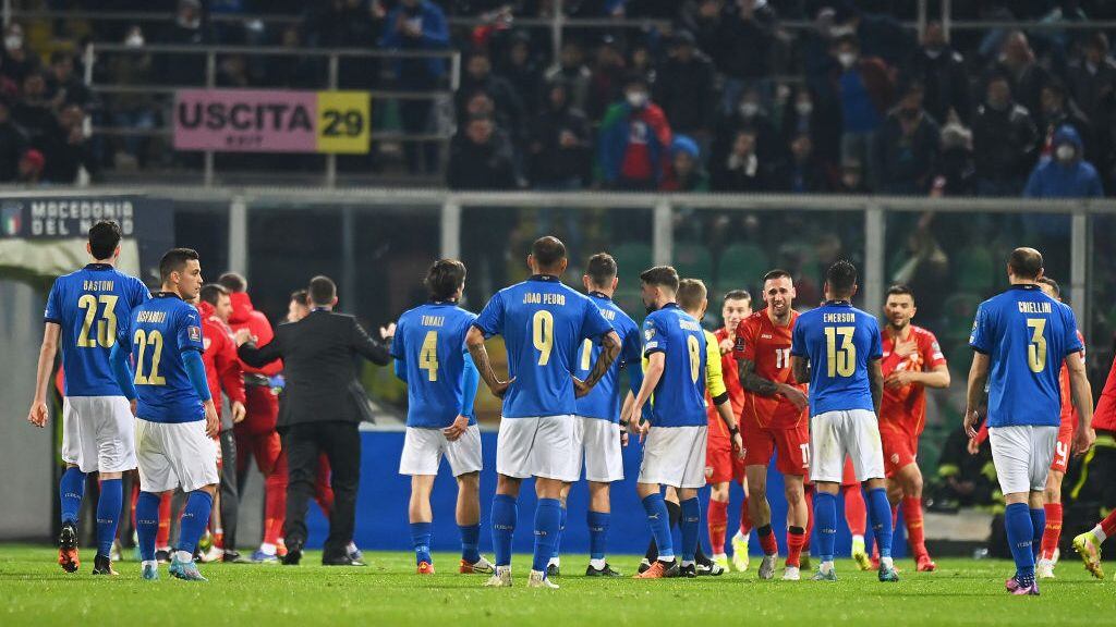 PALERMO, ITALY - MARCH 24: Players of Italy look dejected after conceding their side's first goal scored by Aleksandar Trajkovski of North Macedonia (not pictured) during the 2022 FIFA World Cup Qualifier knockout round play-off match between Italy and North Macedonia at Stadio Renzo Barbera on March 24, 2022 in Palermo, Italy. (Photo by Tullio M. Puglia/Getty Images)