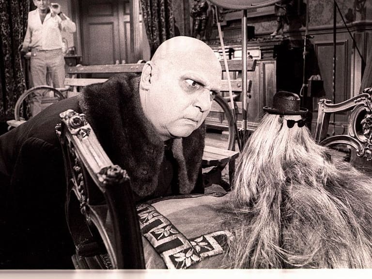 THE ADDAMS FAMILY - "Morticia's Romance" - Airdate: October 1, 1965. (Photo by Walt Disney Television via Getty Images Photo Archives/Walt Disney Television via Getty Images)L-R: SIDNEY LANFIELD (DIRECTOR);JACKIE COOGAN;COUSIN ITT SHRUNKEN