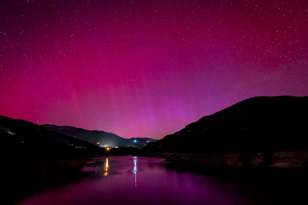 The northern lights, a result of the solar storms from May 2024, are visible from Berga, near Barcelona, on the night of May 10 to 11, 2024, in Barcelona, Catalonia, Spain. (Photo by Albert Llop/NurPhoto via Getty Images)