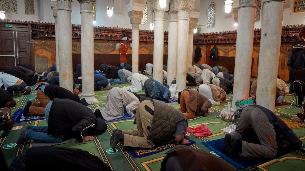 PARIS, FRANCE - OCTOBER 30: Friday prayers at the Grand Mosque in Paris on October 30, 2020 in Paris, France. After prayers there was a reading of a poem ‘For the Republique’ as a homily to French Muslims in support of the laws of the French Republique. The prayers took place under increased security as President Macron announced the number of soldiers patrolling the streets and guarding places of worship and schools would rise from 3,000 to 7,000. (Photo by Kiran Ridley/Getty Images)