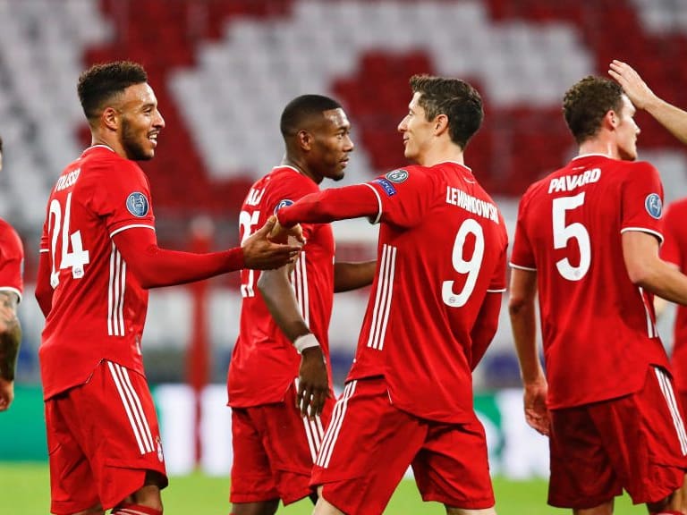 MUNICH, GERMANY - OCTOBER 21: Corentin Tolisso of FC Bayern Muenchen celebrates with teammates after scoring his team&#039;s third goal during the UEFA Champions League Group A stage match between FC Bayern Muenchen and Atletico Madrid at Allianz Arena on October 21, 2020 in Munich, Germany. (Photo by M. Donato/Getty Images for FC Bayern)