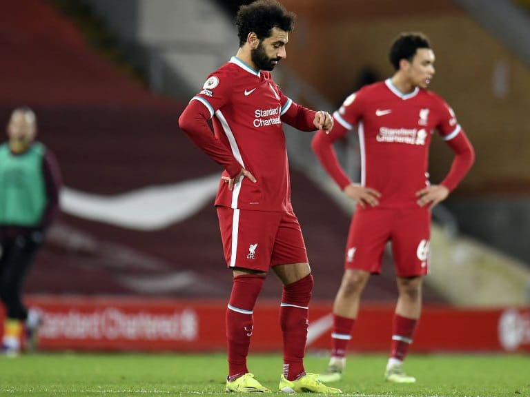 Liverpool&#039;s Mohamed Salah and Trent Alexander-Arnold appear dejected during the Premier League match at Anfield, Liverpool. Picture date: Thursday January 21, 2021. (Photo by Peter Powell/PA Images via Getty Images)