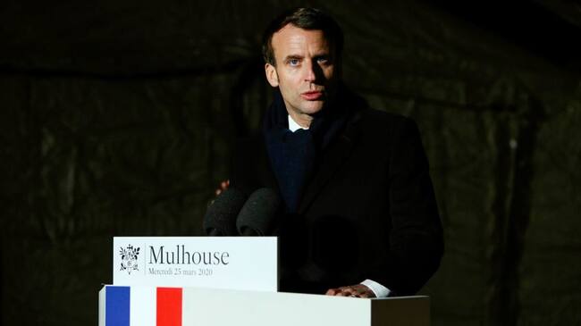 French President Emmanuel Macron delivers speech after the visit of the military field hospital outside the Emile Muller Hospital in Mulhouse, eastern France, on March 25, 2020, on the ninth day of a lockdown aimed at curbing the spread of the COVID-19 (novel coronavirus) in France. (Photo by Mathieu CUGNOT / POOL / AFP) (Photo by MATHIEU CUGNOT/POOL/AFP via Getty Images)