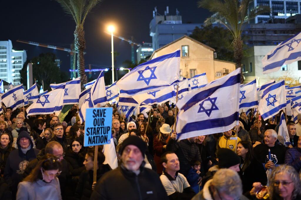 Thousands of Israeli protesters rally against Prime Minister Benjamin Netanyahu's new government in the coastal city of Tel Aviv on February11, 2023. (Photo by Gili Yaari/NurPhoto via Getty Images)
