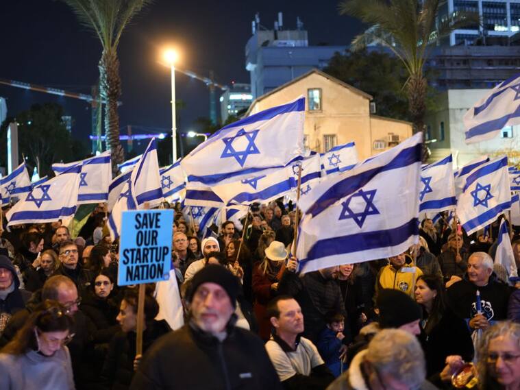 Thousands of Israeli protesters rally against Prime Minister Benjamin Netanyahu's new government in the coastal city of Tel Aviv on February11, 2023. (Photo by Gili Yaari/NurPhoto via Getty Images)