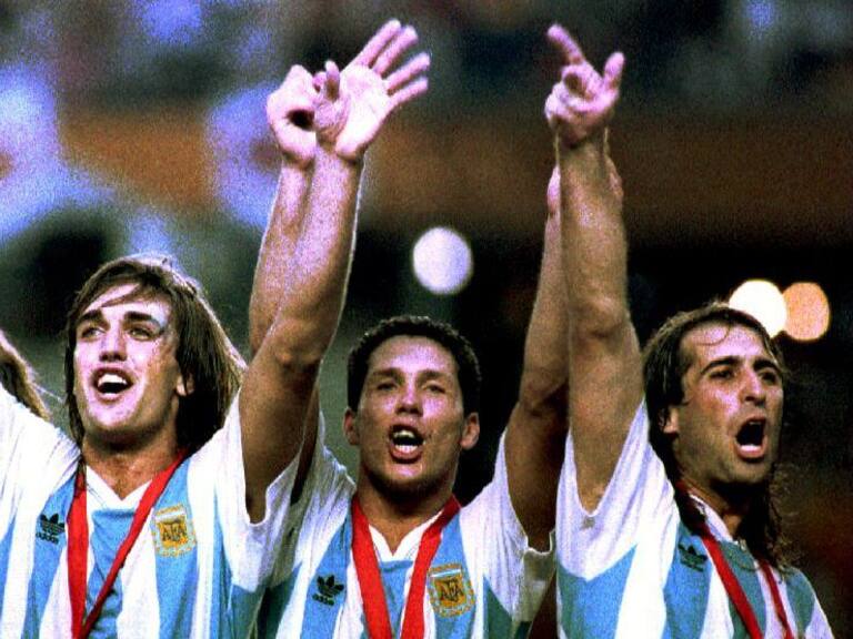 From left, Argentine soccer players Gabriel Batistuta, Diego Simeone, and Leo Rodriguez celebrate their victory 04 July 1993 after they defeated Mexico 2-1 to win the final match of the Copa America soccer championship, in Guayaquil, Ecuador. (Photo by Timothy A. CLARY / AFP) (Photo credit should read TIMOTHY A. CLARY/AFP via Getty Images)