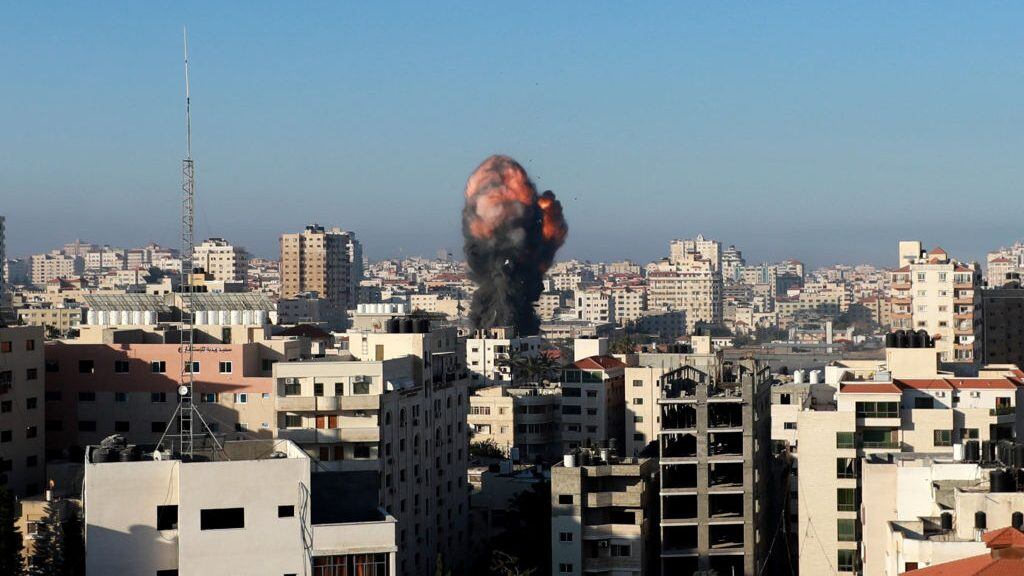 Smoke billows after an Israeli airstrike on Gaza City targeted the Ansar compound, linked to the Hamas movement, in the Gaza Strip on May 15, 2021. - Israel faced a widening conflict on May 14, as deadly violence erupted across the West Bank amid a massive aerial bombardment in Gaza and unprecedented unrest among Arabs and Jews inside the country. (Photo by Majdi Fathi/NurPhoto via Getty Images)