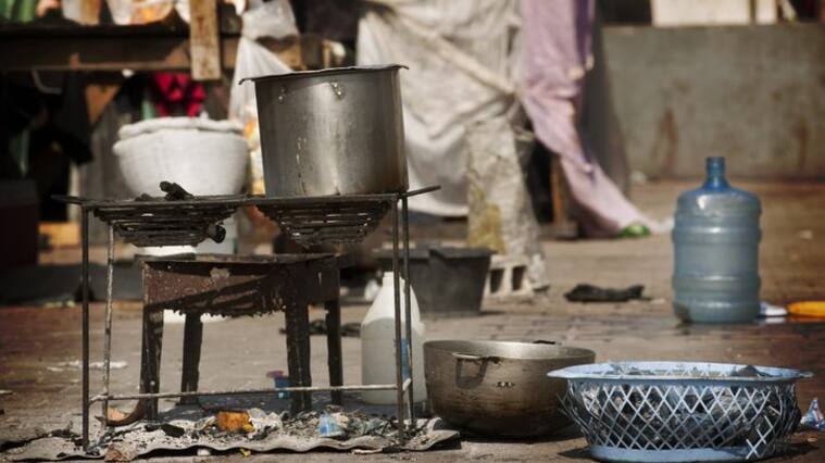"Preparing food for the family. IDP Camp in center of Port au PrinceSee other photos of Haiti, february 2010:"
